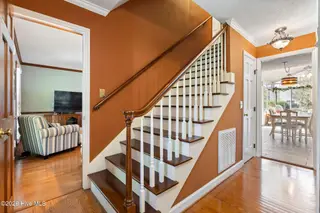 3232 Grey Leaf Drive, Wilmington, NC 28409 — 4-bedroom home in Woodberry Forest, Wilmington, NC, photo 19 of 51: 3232 Grey Leaf stairs to kitchen