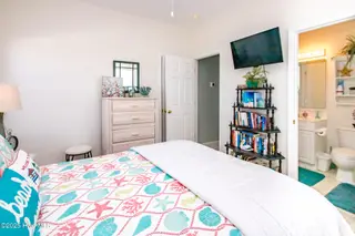 1131 S Shore Drive, Surf City, NC 28445 – photo 11: Top Floor Queen Bedroom II