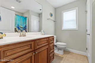 133 NE 3rd Street, Oak Island, NC 28465 – photo 18: 2nd Bathroom
