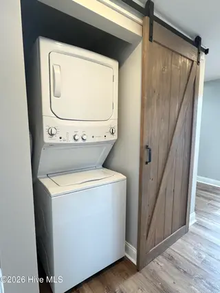 113 NW 12th Street, Oak Island, NC 28465 – photo 10: Laundry Closet