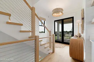 216 Radio Island Road, Morehead City, NC 28557 — 4-bedroom home in Tide Lines, Morehead City, NC, photo 4 of 56: Custom Staircase & Entryway
