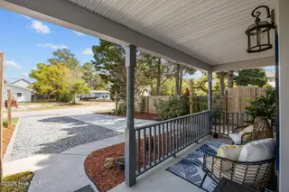 111 NW 10th Street, Oak Island, NC 28465 – photo 5: 11 front porch to street