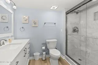 331 Salter Path Road 104 Beachwalk, Pine Knoll Shores, NC 28512 – photo 19: En suite primary bathroom