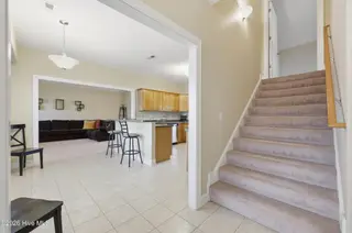 106 Lands End Drive, Elizabeth City, NC 27909 – photo 22: Breakfast Nook/ Stairs to FROG