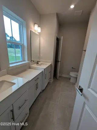 1276 Piper Glen Drive, Sunset Beach, NC 28468 – photo 8: Bathroom