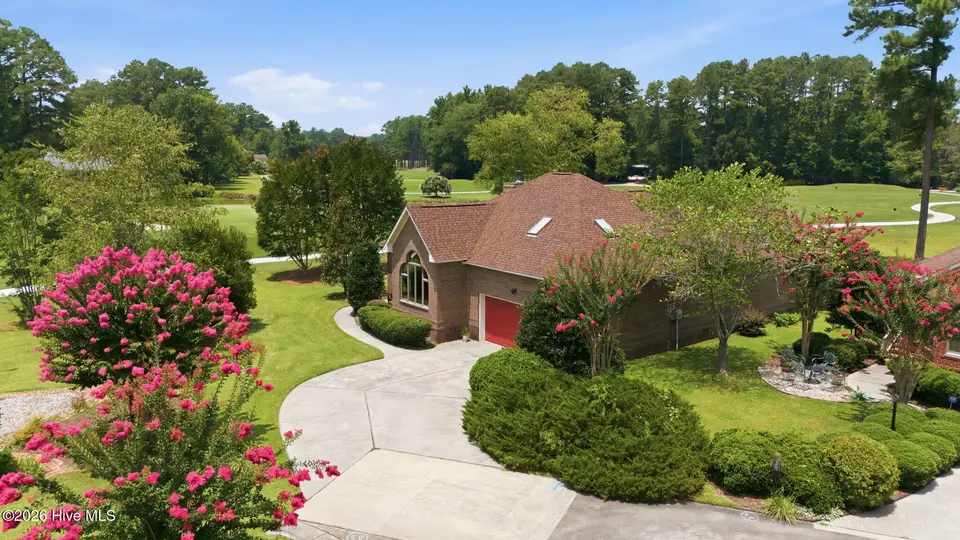 8004 Club House Drive, New Bern, NC 28562 – photo 1 of 28: 02-4-web-or-mls-DJI_20260708125611_0118_