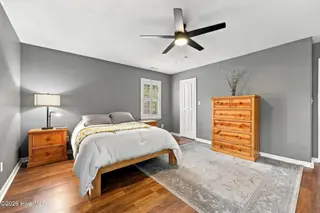 107 Fodder Drive, Hubert, NC 28539 — 3-bedroom home in Ole Mill Village, Hubert, NC, photo 24 of 59: 24_Primary_Bedroom_Angle