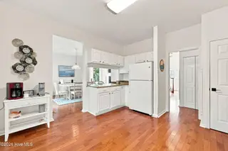 109 Oakleaf Drive, Pine Knoll Shores, NC 28512 – photo 20: Kitchen to Dining