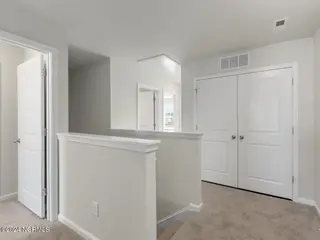 7775 Pennycress Drive 554, Leland, NC 28451 – photo 21: 19- similar to hallway 2