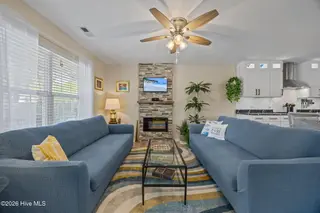111 NW 10th Street, Oak Island, NC 28465 – photo 8: 19 living room