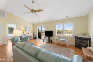 6611 Marsh Cove Road, Emerald Isle, NC 28594 – photo 10: Living room with sound views