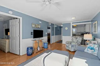 1000 Caswell Beach Road Apt. 806, Oak Island, NC 28465 — 2-bedroom condo in Oak Island Bch Villa, Oak Island, NC, photo 20 of 56: Living room and Dining Area