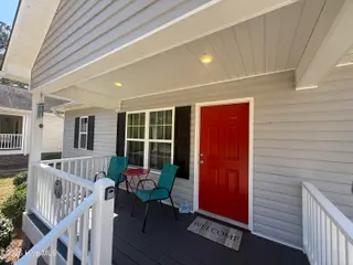 115 NW 17th Street, Oak Island, NC 28465 — 2-bedroom home in Pinners Point, Oak Island, NC, photo 3 of 7: Front Porch