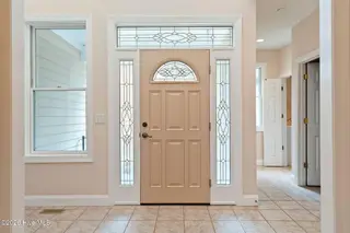 86 Plantation Passage Drive SE, Bolivia, NC 28422 — 4-bedroom home in Winding River Plantation, Bolivia, NC, photo 4 of 77: Foyer