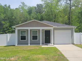 187 Shamrock Drive SW, Sunset Beach, NC 28468 – photo 1: 187 Shamrock Dr. SW