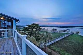 6008 W Beach Drive, Oak Island, NC 28465 – photo 10: 6008WestBeachDrive_twilight-3