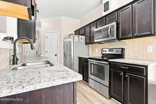 1768 Oak Pointe Drive, Greenville, NC 27834 – photo 11: 31-web-or-mls-IMG_0056-edit