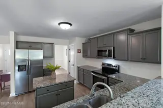 107 Peletier Shores Drive, Peletier, NC 28584 – photo 15: Kitchen with granite countertops