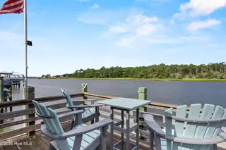 104 SW Yacht Drive, Oak Island, NC 28465 — 5-bedroom waterfront home, Oak Island, NC, photo 4 of 77: 94_dock