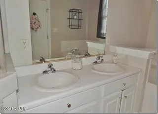 4311 Portsmouth Drive NW, Wilson, NC 27896 – photo 24: 23 Master Bathroom Dual Vanities