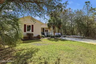 142 NW 8th Street, Oak Island, NC 28465 – photo 4: 142NWEighthSt-21