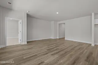 1727 Saucepan Bay Drive SW, Shallotte, NC 28470 – photo 12: Living area view from casual dining