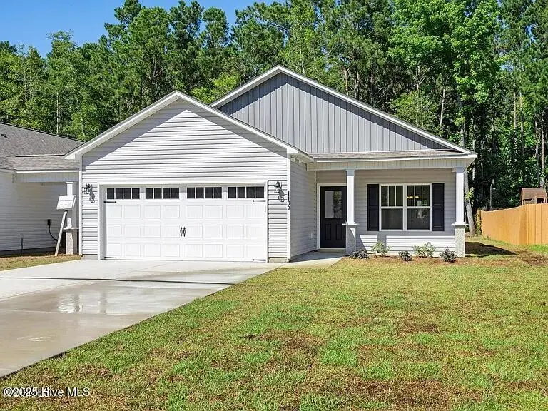 1189 Dan Owen Drive, Hampstead, NC 28443 – photo 1 of 27: Outside Front