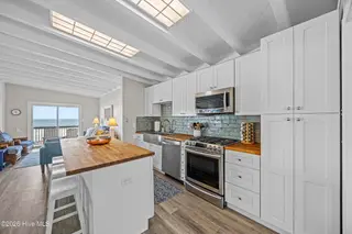 5127 W Beach Drive, Oak Island, NC 28465 – photo 6: 36_kitchen