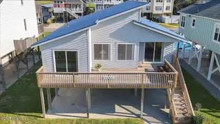 1708 W Beach Drive, Oak Island, NC 28465 – photo 2: 53-Final 1708 W Beach Dr OKI-RJREM-0006