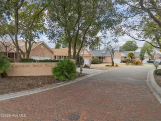 117 Lighthouse Drive, Carolina Beach, NC 28428 – photo 2: 13-web-or-mls-DJI_20260302140141_0784_D