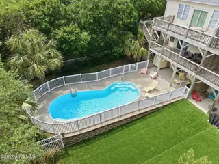 9911 Chrissie Wright Court West, Emerald Isle, NC 28594 – photo 7: 18-web-or-mls-DJI_20260513144649_0422_D(