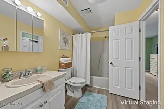 1928 New River Inlet Road 214, North Topsail Beach, NC 28460 – photo 16: Guest Bathroom Staged