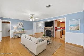 354 W South Shore Drive, Southport, NC 28461 — 3-bedroom home in Boiling Spring Lakes, Southport, NC, photo 20 of 39: 33 photo living room staged