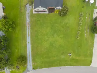 313 Oakmont Drive, Hampstead, NC 28443 – photo 15: 15-web-or-mls-DJI_20250811101509_0206_D