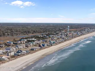 1025 W Beach Drive, Oak Island, NC 28465 – photo 2: 11-web-or-mls-DJI_20260122122152_0279_D