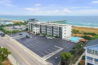 711 S Lumina Avenue 111, Wrightsville Beach, NC 28480 — 1-bedroom condo in Surf Motel Condo, Wrightsville Beach, NC, photo 2 of 16: Surf Suites 111 2