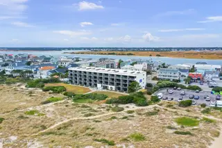 711 S Lumina Avenue 103, Wrightsville Beach, NC 28480 — 1-bedroom condo in Surf Motel Condo, Wrightsville Beach, NC, photo 1 of 19: Surf Suites 103 0