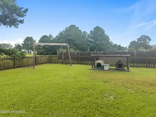 313 Oakmont Drive, Hampstead, NC 28443 – photo 11: 11-web-or-mls-DJI_20250811101400_0202_D