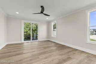 1827 Olde Farm Road, Morehead City, NC 28557 – photo 18: Primary Suite with Porch Access