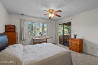 204 Fairway Court, Southern Pines, NC 28387 – photo 18: primary bedroom to balcony
