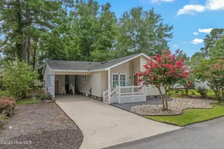 396 Deer Path, Calabash, NC 28467 – photo 1: 396 Deer Path in Calabash, NC