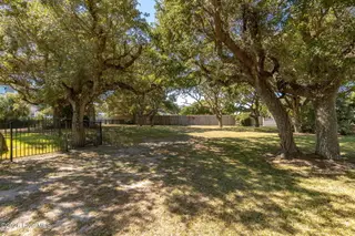 106 Ocean Bluff Drive, Indian Beach, NC 28512 — lot in Ocean Bluff, Indian Beach, NC, photo 11 of 15: Vacant Lot in a Wooded Area