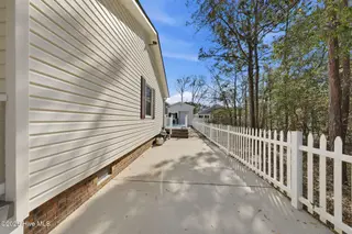 142 NW 8th Street, Oak Island, NC 28465 – photo 9: 142NWEighthSt-51