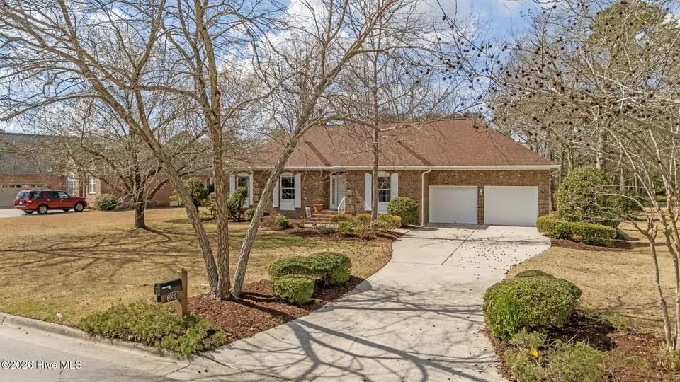 6002 Club House Drive, New Bern, NC 28562 – photo 1 of 55: 1-web-or-mls-DJI_20260306130912_0591_D