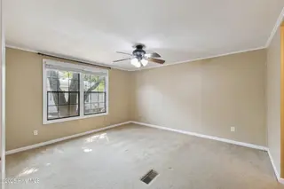630 Dogwood Drive, Sunset Beach, NC 28468 – photo 15: Primary Bedroom