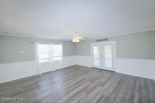 802 E Oak Island Drive, Oak Island, NC 28465 – photo 10: Family Room-017-027-1500x1000