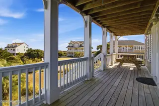 1254 Ocean Boulevard W, Holden Beach, NC 28462 — 5-bedroom home in Holden Beach West, Holden Beach, NC, photo 7 of 66: 6_front porch 1-2