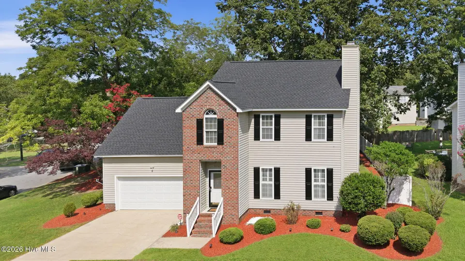 2110 Sir Raleigh Court, Greenville, NC 27858 – photo 1 of 55: 5-web-or-mls-DJI_20260813110700_0583_D_e