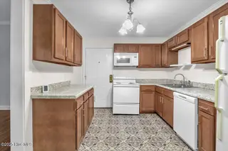 103 N 13th Street, Wilmington, NC 28401 — 6-bedroom home, Wilmington, NC, photo 22 of 60: 09-Final 103 N 13th St Back RJREM-1442