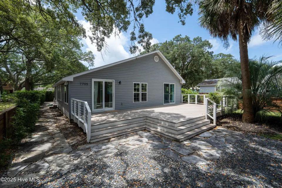 7705 E Oak Island Drive, Oak Island, NC 28465 – photo 1 of 43: 7705 E Oak Island Dr